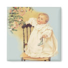 square_magnet - An infant gazes in wonder at decorations hanging from the Christmas tree. A stocking is clutched in babys hand while holding tightly to a chair with the other. First Christmas 2007 text on baby clothing.: Sizes 