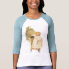 ladies_fitted_raglan - An infant gazes in wonder at decorations hanging from the Christmas tree. A stocking is clutched in babys hand while holding tightly to a chair with the other. First Christmas 2007 text on baby clothing.: Sizes  Available colors: whitebabyblue