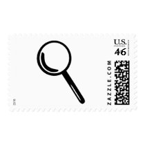 Magnifying glass postage stamp