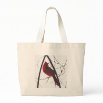 Male cardinal in snow 11 tote bags
