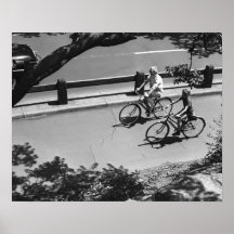 Man and Boy Cycling Posters