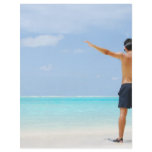 man getting ready to go snorkeling in a tropical i flyers