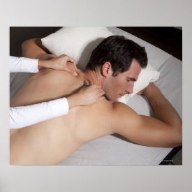 Man having a back massage from woman posters
