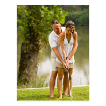 Man helping woman golf postcard