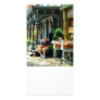 Man Reading by Book Stall Photo Card