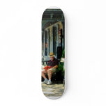 Man Reading by Book Stall Skateboard