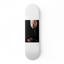 man with gun skateboard