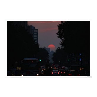Manhattanhenge: setting pinkish orange sun 5/31/11 poster