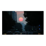 Manhattanhenge: setting pinkish orange sun business card templates