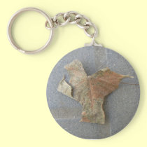 Maple leaf on pavement keychains