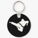 martial arts silhouettesfists of fire. keychains