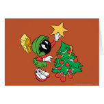Marvin the Martian putting star on tree Greeting Cards