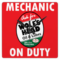 Mechanic on Duty sign. Wolf Head Oil version wall clocks