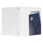 medical stethoscope on blue folder binders