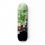 Medicine and Hurricane Lamp on Desk Skate Boards