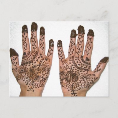 Hands covered with Henna, a temporary Tattoo. Hands are decorated for a 