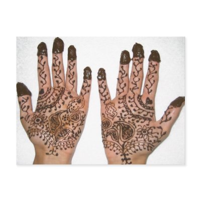 Hands covered with Henna, a temporary Tattoo. Hands are decorated for a 