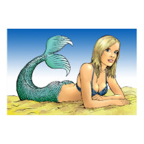 Mermaid lying on a sandy beach posters