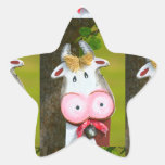 merry, painted cow from wood,