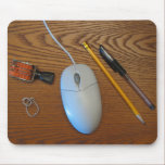 desk, mouse, stamp, rubber band, pencil pen mess