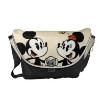 Mickey and Minnie Holding Hands Courier Bags at Zazzle