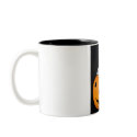 Mini Rex in a pumpkin mug
