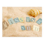 Missing you on the sand with seashell postcards