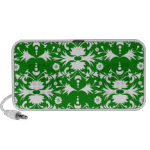 Modelo blanco elegante del damasco en verde laptop altavoz