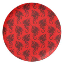 Modelo rojo del gato que remolina platos