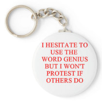 modest genius joke keychain