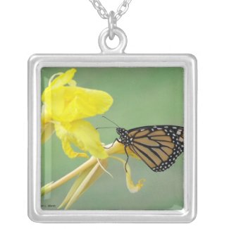 Monarch butterfly on yellow flower simple back necklace