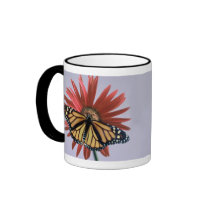Monarch on a Daisy mugs