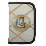 Monogrammed gold and silver effect letter G Planners
