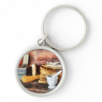 Mortar and Pestle and Box of Cocoa keychains