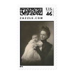 mother holding baby postage
