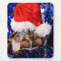 Mud turtle with head covered in santa hat mouse pad