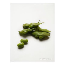 multiple green edamame beans with pea pod broken post card