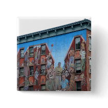 Mural on building in Spanish Harlem buttons