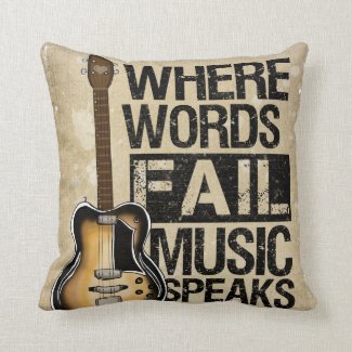 Music Speaks Throw Pillows