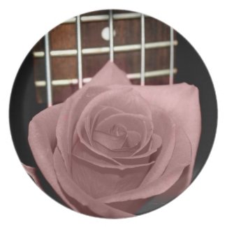 Muted dark pink rose with five string bass fboard plate