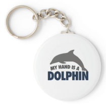 My hand is a dolphin keychain