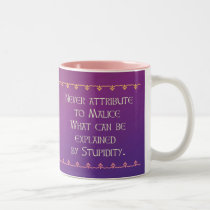 Never attribute to Malice mugs