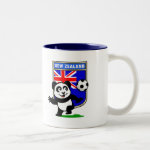 This adorable little panda is too cute! He's featured in front of a large flag from New Zealand and ready to play football and score some goals. This cute design is perfect for football players and soccer fans.