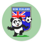 This adorable little panda is too cute! He's featured in front of a large flag from New Zealand and ready to play football and score some goals. This cute design is perfect for football players and soccer fans.