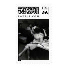 postcard - This is a wonderful old image of a romantic couple kissing at a restaurant. The bride still has a garter belt on.