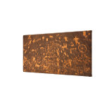 Newspaper Rock is a petroglyph panel etched in Stretched Canvas Prints