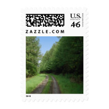 Nice scenic view of a pathway and trees. stamps