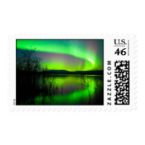 Northern lights mirrored on lake stamps