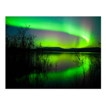 Northern lights mirrored on lake postcards