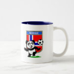 This adorable little panda is too cute! He's featured in front of a large flag from Norway and ready to play football and score some goals. This cute design is perfect for football players and soccer fans.
